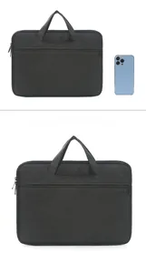 Business laptop bag in black durable fabric shown with phone for size reference