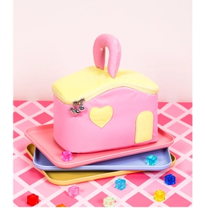 Detailed view of house-shaped polyester cosmetic bag with heart zipper and top handle