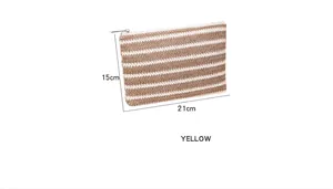 Detailed size view of yellow striped woven makeup bag measuring 21cm by 15cm with zipper