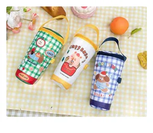 Detail of checkered canvas cup bags with cute animal prints and durable top handles