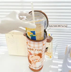 Ins-style brown plaid insulated cup sleeve with cartoon bear and foil lining detail