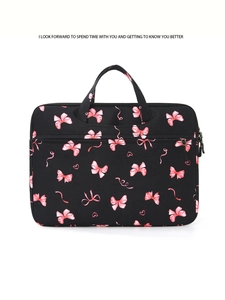 Close-up of laptop bag showing pink bow prints and a smooth metallic zipper closure