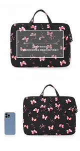 Detailed view of bow pattern laptop sleeve with durable zippers and sturdy handle