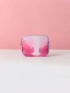 Detail view of the pink quilted makeup bag with a stylish gradient heart pattern and zipper