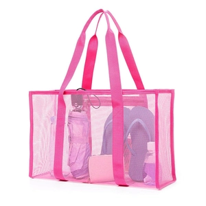 Pink mesh beach tote bag with large capacity for travel accessories on white background