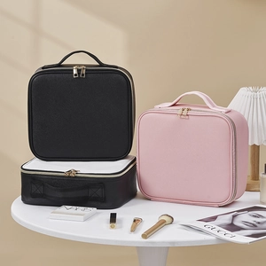 Three-piece makeup bag set in black and pink PU leather with handle and mirror for travel