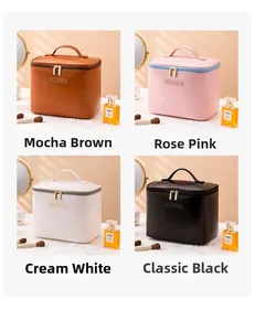Four colors of portable PU leather makeup bags with handles and dual zippers