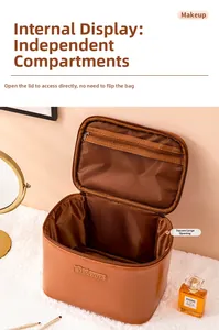 Detailed interior of a brown PU makeup bag with mesh pockets and dividers for storage