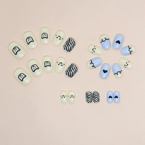 Cute kids' cartoon bear press-on nails in yellow and blue with smile faces