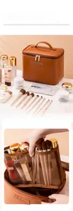 Detail view of large capacity makeup bag with removable brown mesh interior organizers