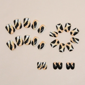 Short square press-on nails with stylish orange and black animal pattern design
