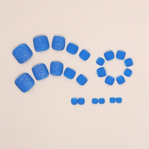 Royal blue Morandi press-on toenails featuring matte finish and silver glitter accents