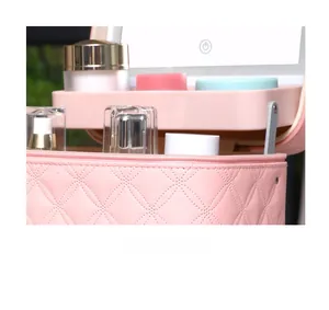 Close-up of pink quilted leather makeup case with LED mirror and multi-layer storage