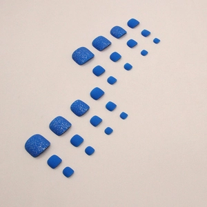 Royal blue glitter press-on toenails featuring shimmering finish in various sizes