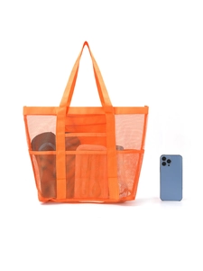 Detail showing orange mesh beach bag with multiple pockets and phone for size scale