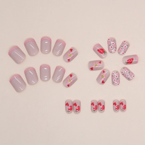 Short French press-on nails with cute floral, strawberry and smiley face patterns