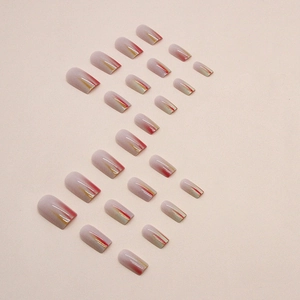 Glossy pink press-on nails with orange flame gradient pattern in 24-piece set