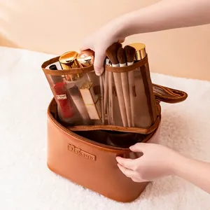 Large capacity brown leather makeup bag with removable mesh dividers and top handle
