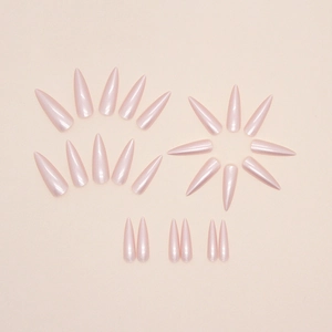 Long stiletto press-on nails set in iridescent pearlescent pink with glossy finish