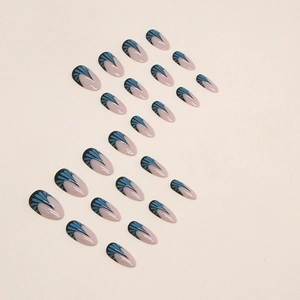 Almond-shaped press-on nails with blue teal fish-tail pattern and nude pink base