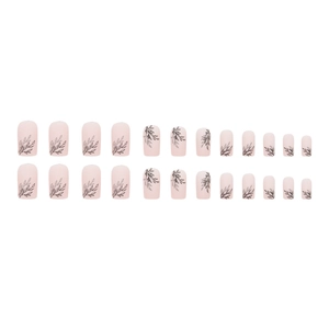 Frosted matte square press-on nails with black leaf silhouette design on nude pink base