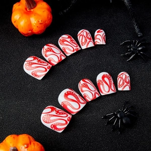 Short red snake pattern press-on nails with white base for Halloween style