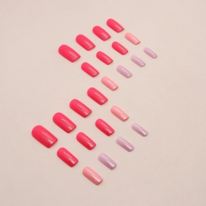 Glossy pink aurora press-on nails in various shades for a trendy long-length manicure look