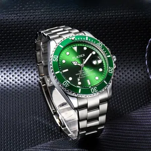 Detailed macro view of the luminous green dial with date window on this quartz dive watch