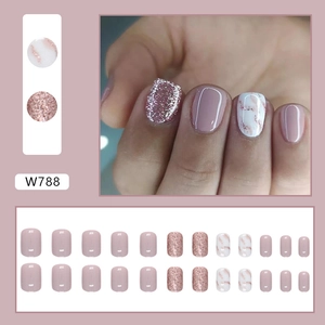 Pink marble texture press-on nails with glitter accents and elegant ink wash design