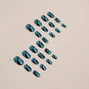 Blue and black wavy pattern round oval press-on nails set of 24 pieces on beige background