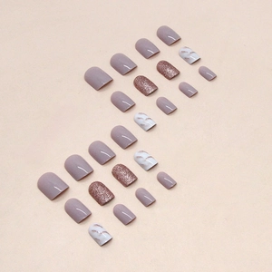 Short square mauve press-on nails set with marble texture and rose gold glitter design