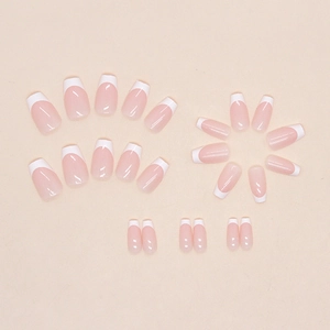 Classic white French tip press-on nails set with nude base in ballet shape