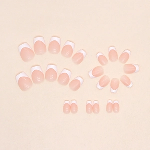 French tip press-on nails in nude pink and white, short ballerina shape set