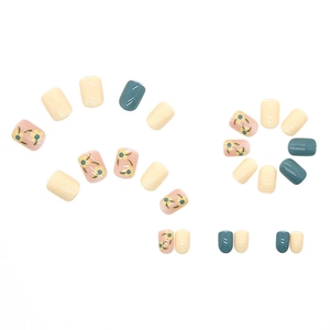 Short square floral press-on nails in cream white, dusty blue, and pink flower patterns