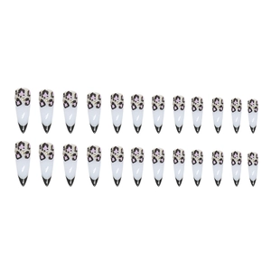 Long pointed almond press-on nails with leopard print, black French tips and rhinestones