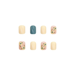 Short square press-on nails in creamy yellow and blue with delicate floral patterns