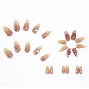 Waterdrop press-on nails set with 3D bows and heart rhinestones in almond shape