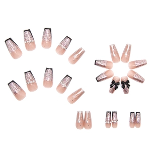 Sparkly black bow and rhinestone ballerina press-on nails with silver glitter gradient