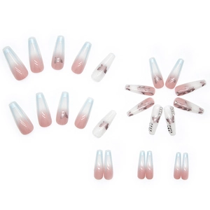 Long ballet press-on nails with pink-blue gradient, butterfly patterns, and rhinestones
