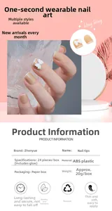 Vue détaillée d'ongles nude à coller avec nœuds 3D blancs et kit ABS de 24 pièces inclus
