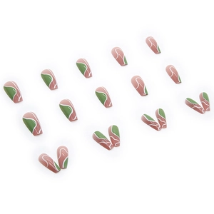 Press-on coffin nails with pink-brown and green color block wave patterns in matrix layout