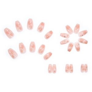 Pink gradient heart press-on nails in medium ballerina shape with sparkling rhinestones