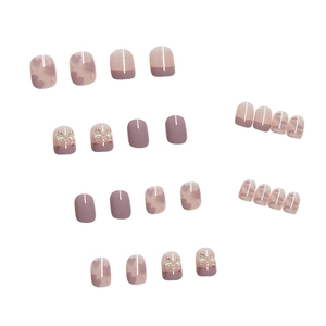 Press-on nail set with light purple heart patterns and 3D bow tie decorations