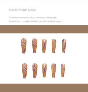 Detail of long ballerina press-on nails with purple wavy lines and silver rhinestones