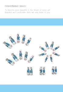Detail of long ballerina press-on nails with white base, blue graffiti and pink patterns