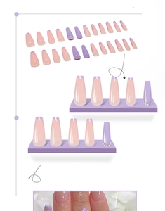 Detail of pink and purple coffin press on nails with rhinestones and French tip design