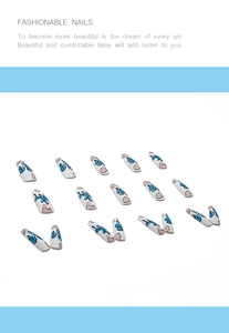 Detailed grid of long coffin press-on nails with artistic blue and pink graffiti designs