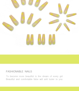 Detail of long coffin press on nails featuring nude base and neon yellow lightning patterns