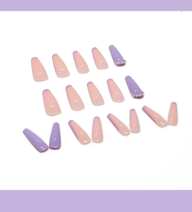 Long trapezoid press on nails in lavender and nude pink with rhinestones and gradient