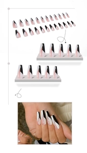 Detail view of long coffin press on nails with black, white and nude geometric design